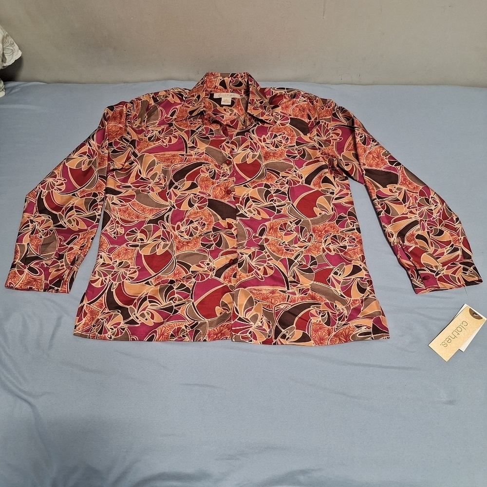 C.L.O.T.H.E.S. silk long sleeve top in a  women's medium.  NWT